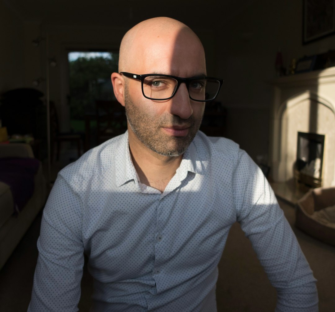 Professional man portrait with glasses smiling