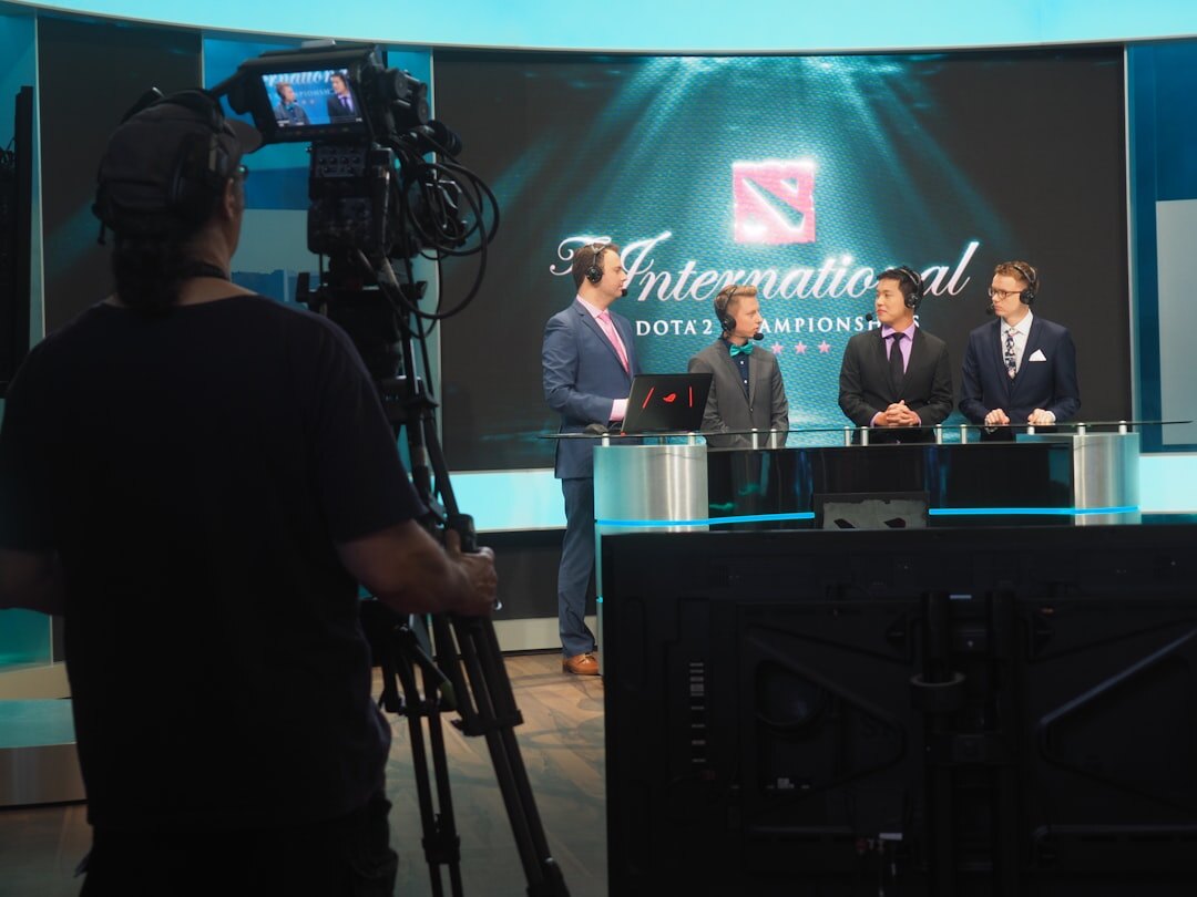 News studio desk with microphones and monitors